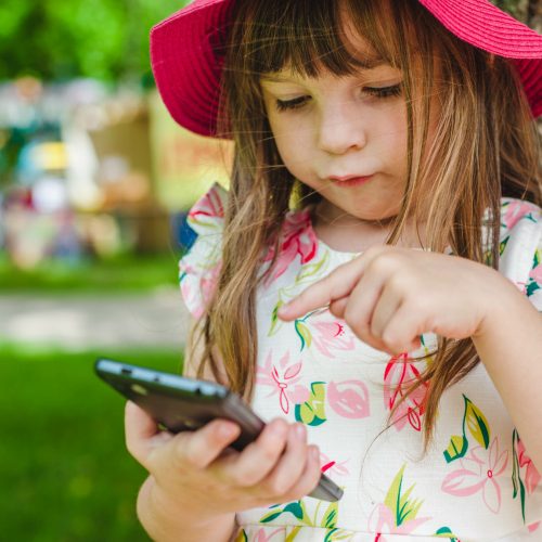little-kid-playing-with-mobile